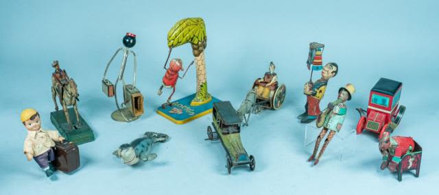 Lot 167: Lot of 11 Vintage Tin Toys