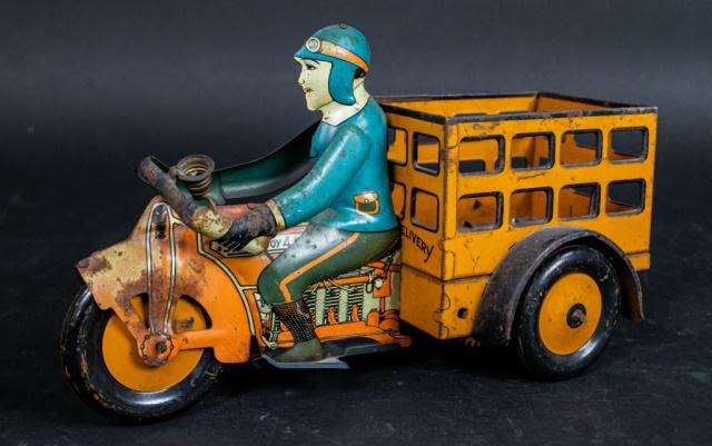 Lot 169: Marx Speed Boy 4 Delivery Tin Litho Wind-Up Toy