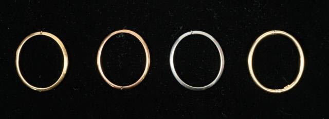 Lot 270: 4 18 Karat Gold Bangles