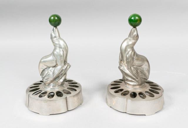 Lot 397: Pair of Metal Seal Bar Decorations