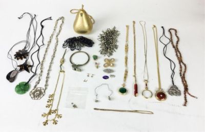 Lot of Costume Jewelry. Including gold and silver tone, beaded necklaces, MMA pendants, Yves St 