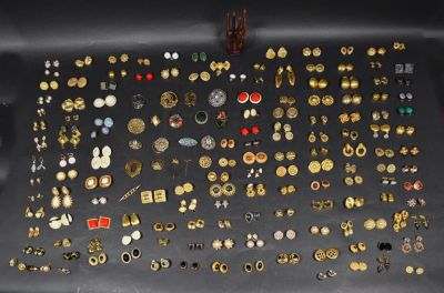 Collection of Costume Jewelry and Brooches. A collection of costume clip on earrings and 