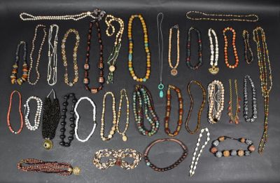 Collection of Natural Necklaces. Approximately 33 natural and neutral colored gem necklaces. 
