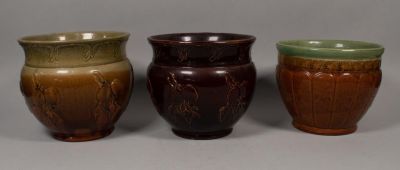 3 English Brown Stoneware Planters. 3 English brown stoneware planters with harvest motifs. 