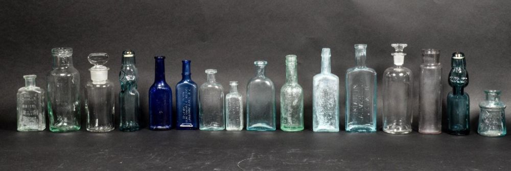Lot 384: 16 Blue & Clear American Glass Bottles