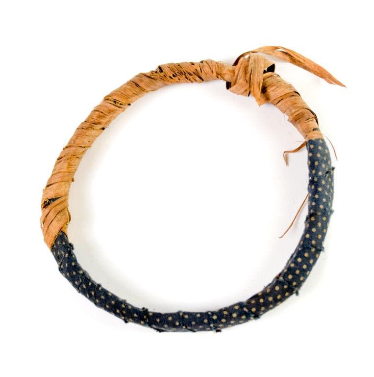Lot 212: Round Band of Rattan and Cloth