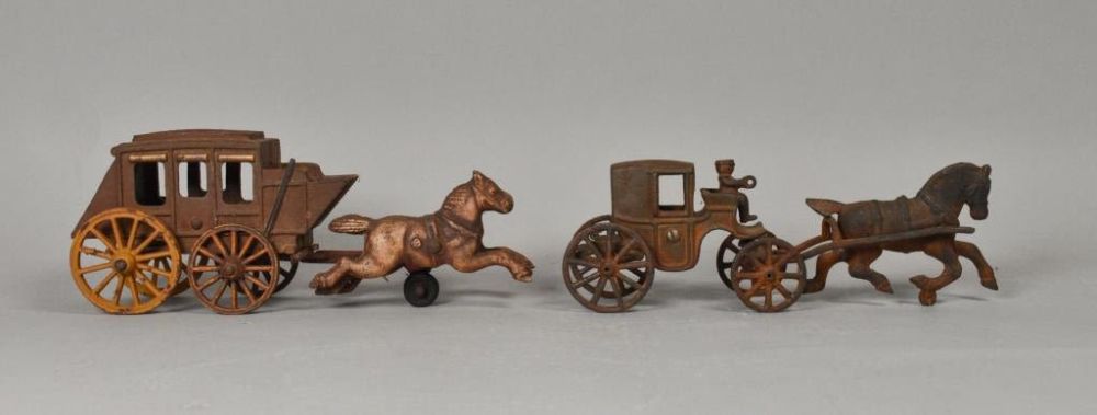 Lot 301: 2 Cast Iron Horse Drawn Carriages