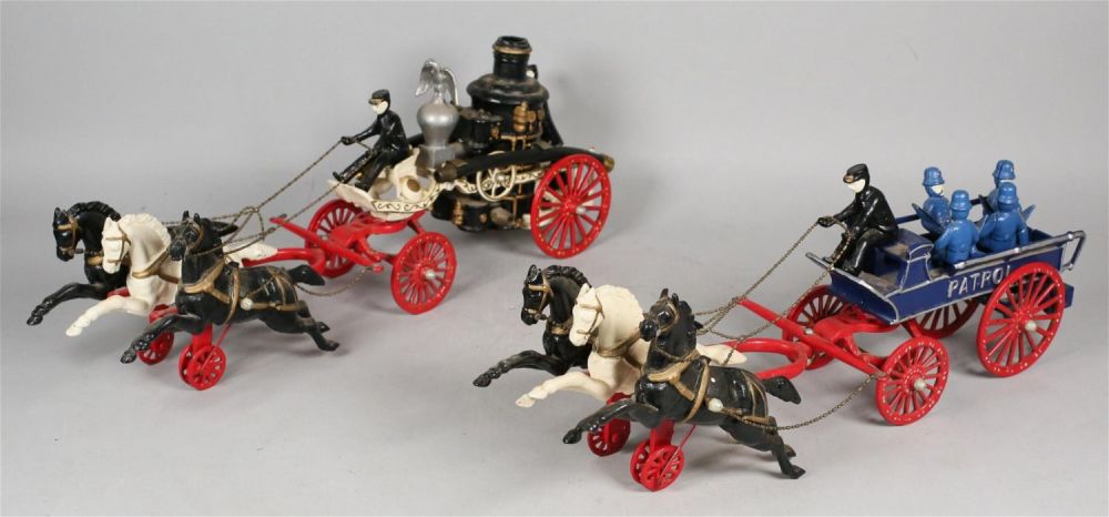 Lot 303: Cast Iron Police Patrol and Fire Pumper