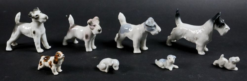 Lot 429: 8 German Porcelain Dogs