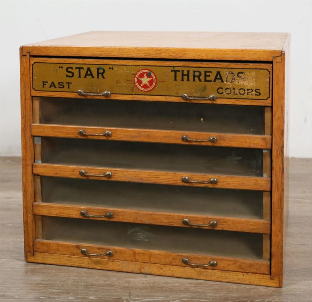 Lot 229: "Star Threads Fast Colors" Oak Spool Cabinet