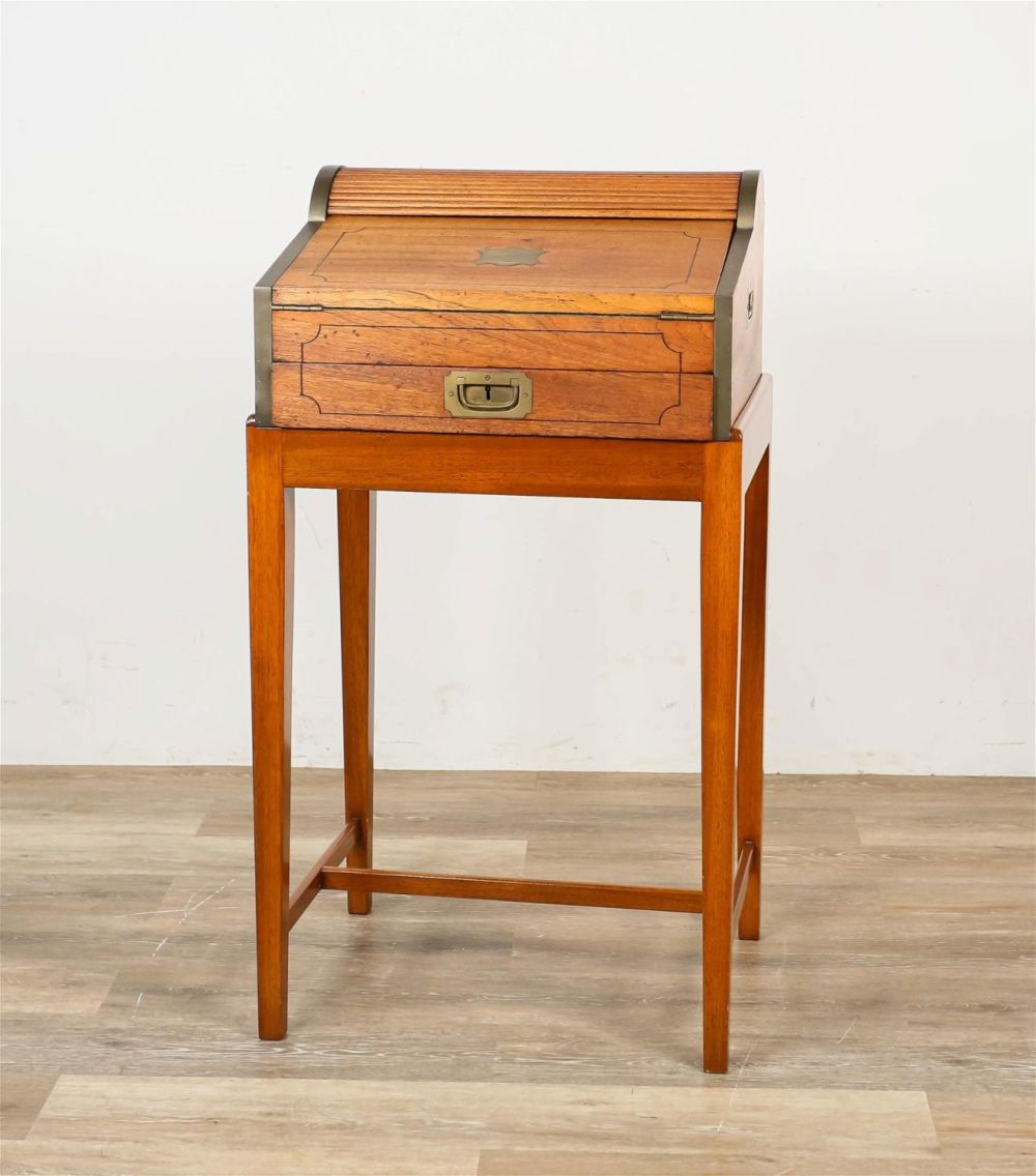 Lot 157: Camphor Wood and Brass Campaign Desk and Stand