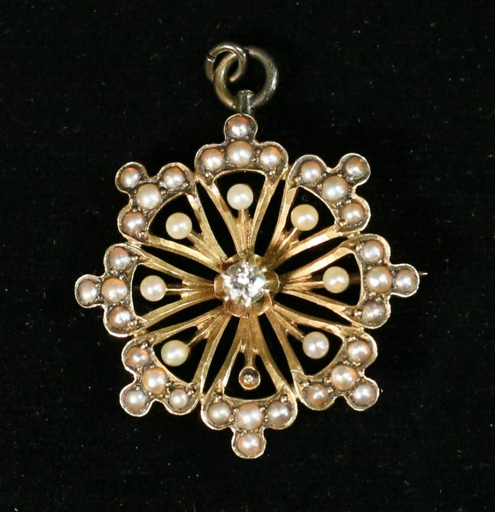 Lot 378: 14K Gold and Diamond Pin Pendant