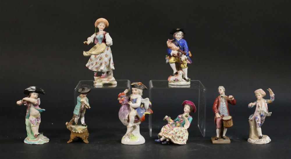 Lot 188: 8 Porcelain Figurines