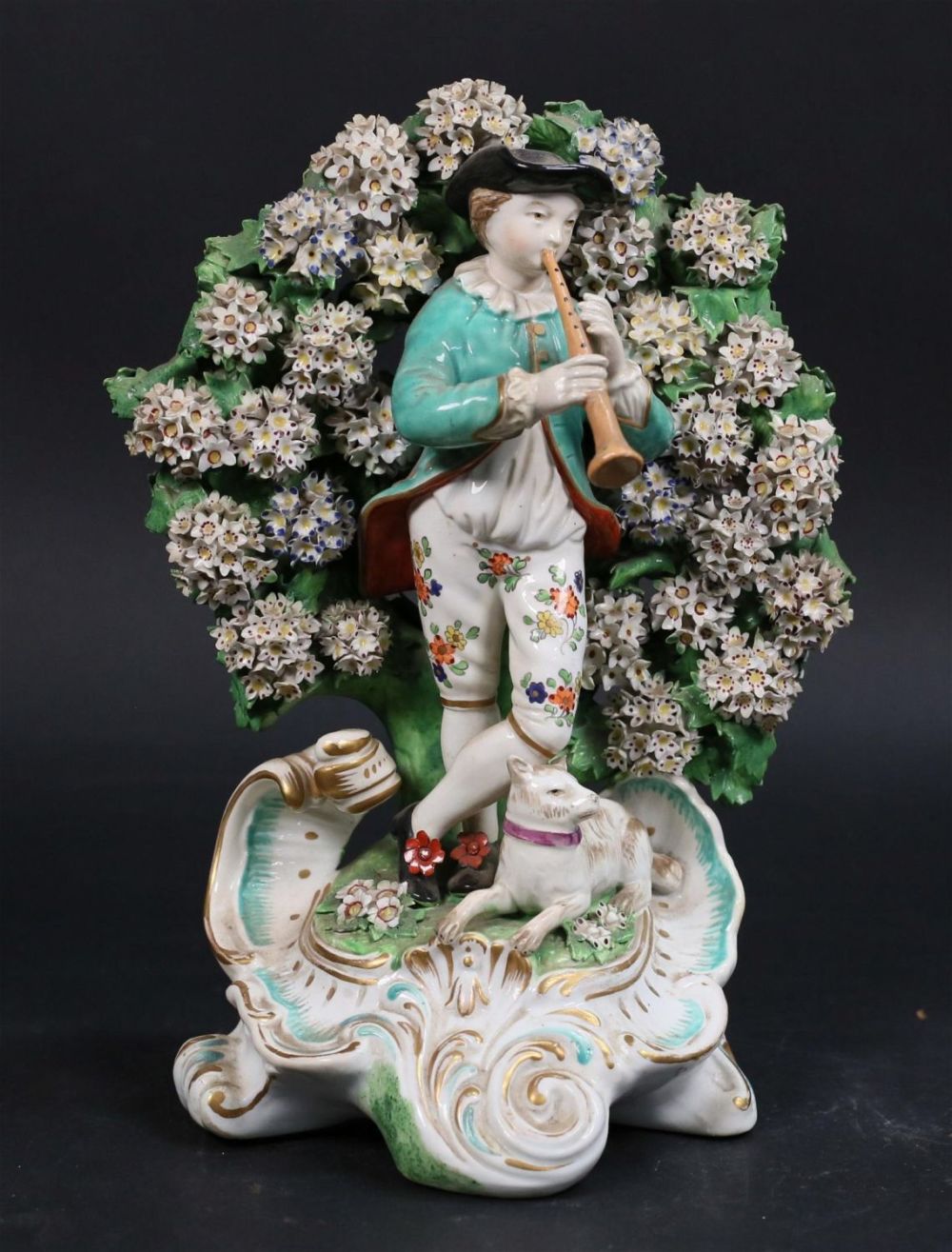 Lot 191: Chelsea Porcelain Bocage Musician Figure