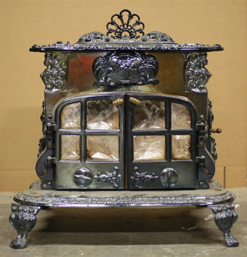 Lot 249: Smith and Wellstood Cast Iron Stove