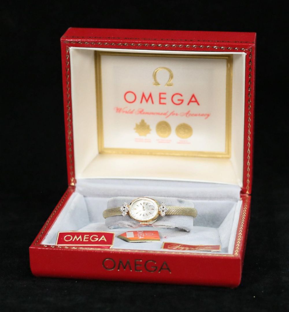 Lot 260: Omega Sapphette 14k Gold & Diamond Watch