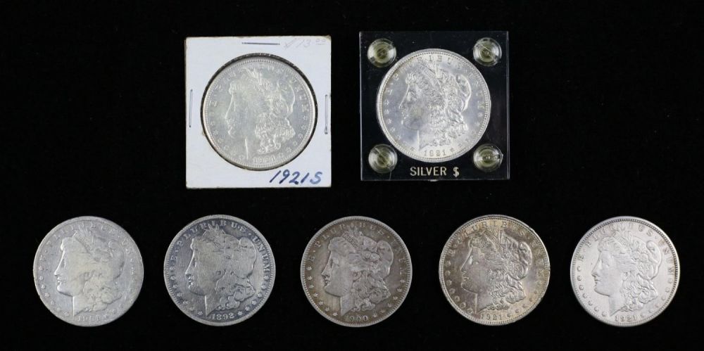 Lot 280: 7 Morgan Silver Dollars
