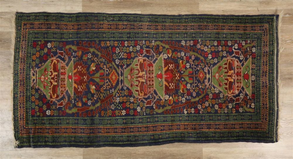 Lot 201: Floral and Urn Motif Rug