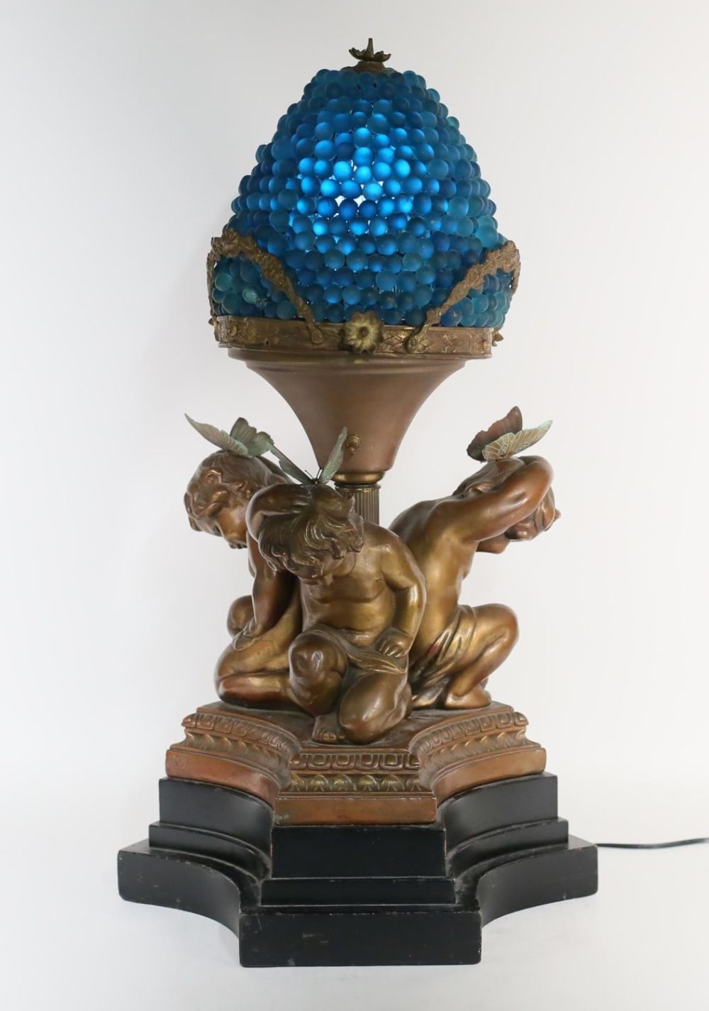 Lot 446: Armor Bronze Clad Cupid Lamp Glass Grapes Shade