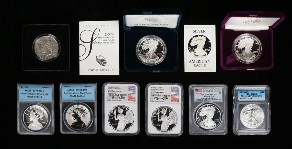 Lot 467: 9 Silver Coins And Medals American Eagles