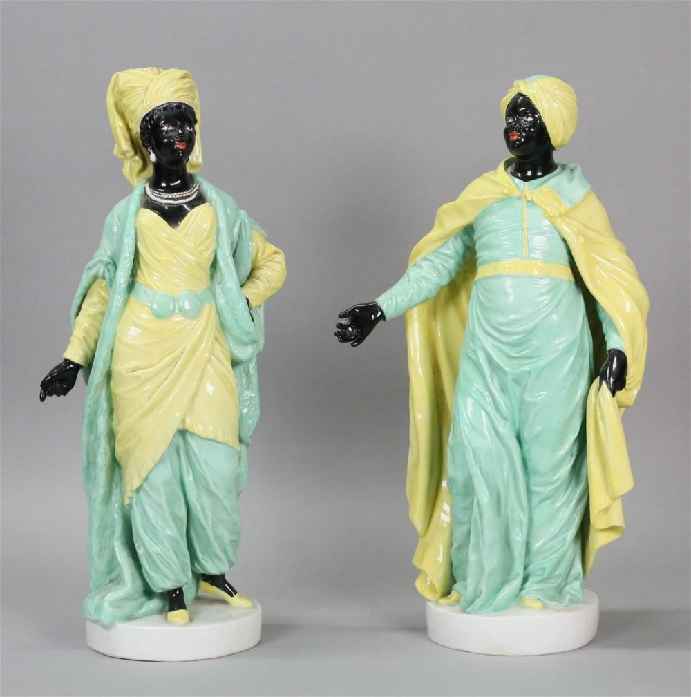 Lot 555: Pair of Porcelain Blackamoor Figures