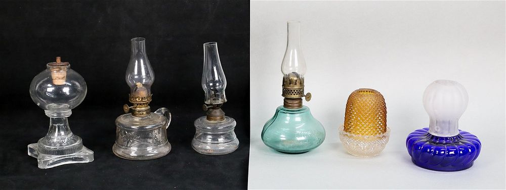 Lot 201: 6 Oil Glow Lit Fluid And Fairy Lamps