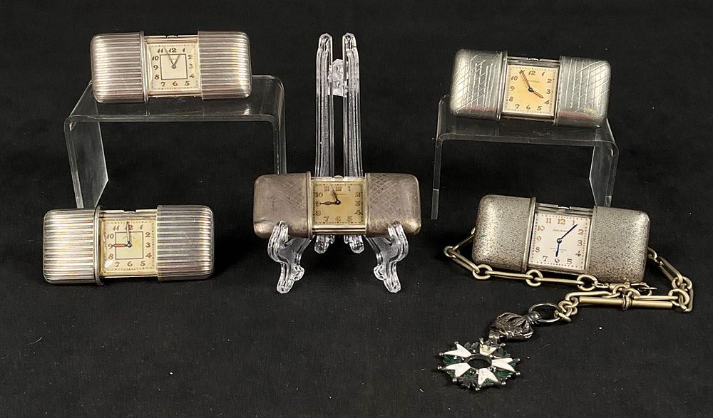 Lot 231: 5 Movado Silver & Silver Tone Purse Watches
