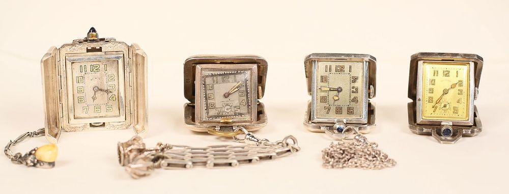 Lot 238: 4 Sterling Purse / Pendant Watches