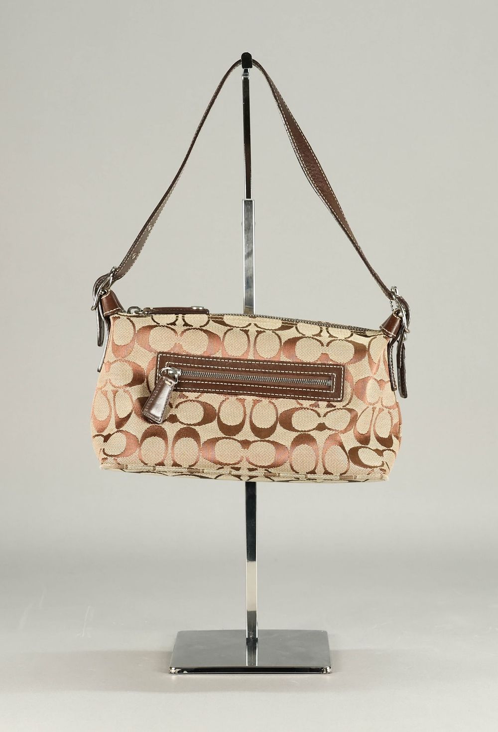 Lot 426: Coach Taupe and Brown Monogram Baguette Handbag