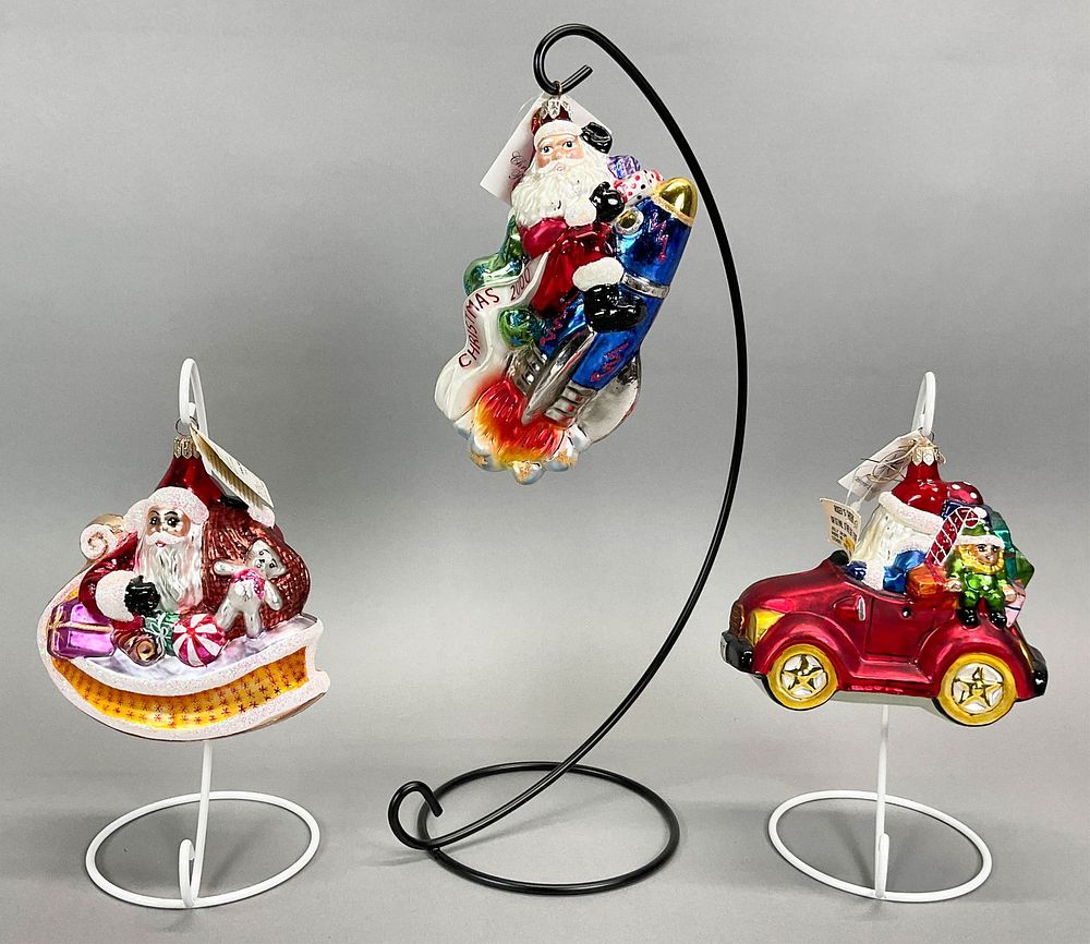 Lot 222: 3 Radko Santa Claus Christmas Ornaments Car Rocket