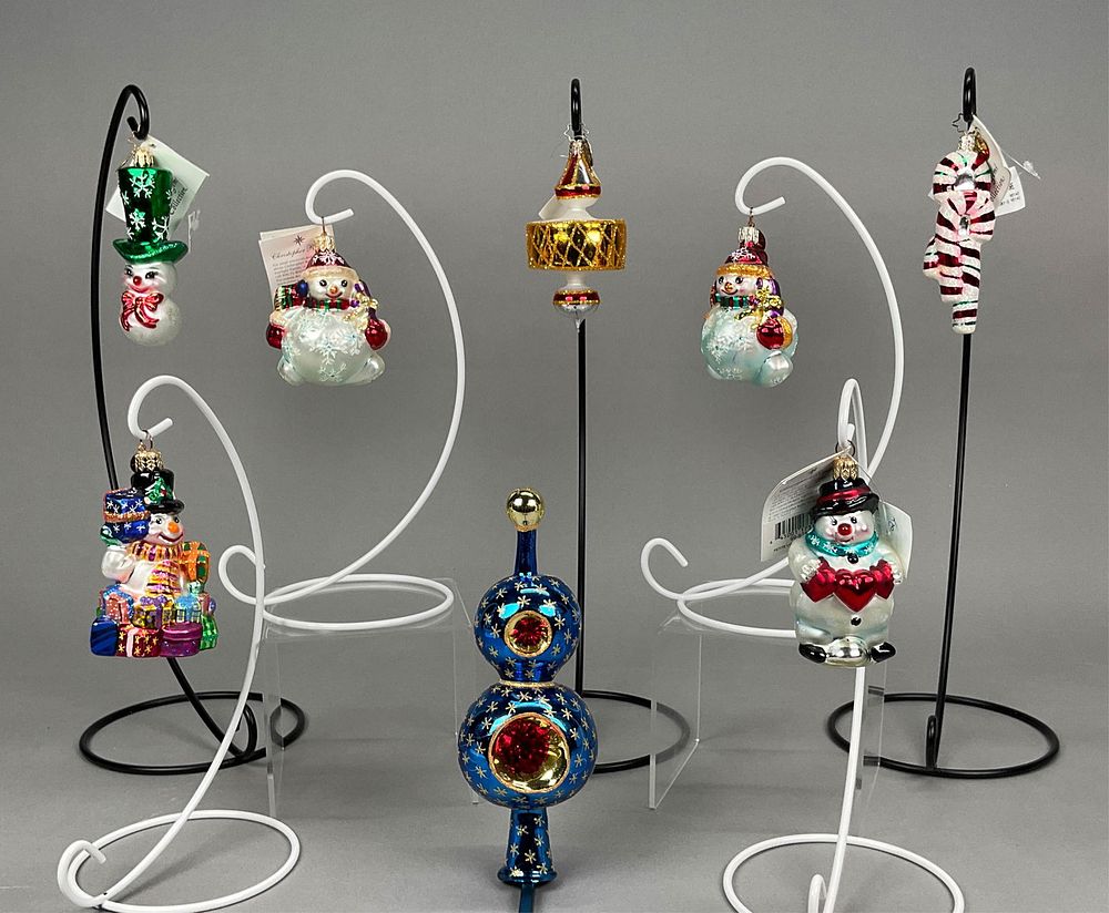 Lot 299: 8 Radko Christmas Ornaments & Topper Candy Cane