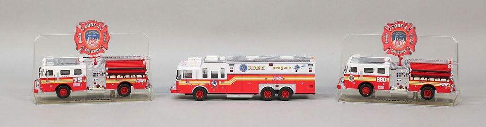 Lot 319: 3 FDNY Model Fire Trucks Code 3