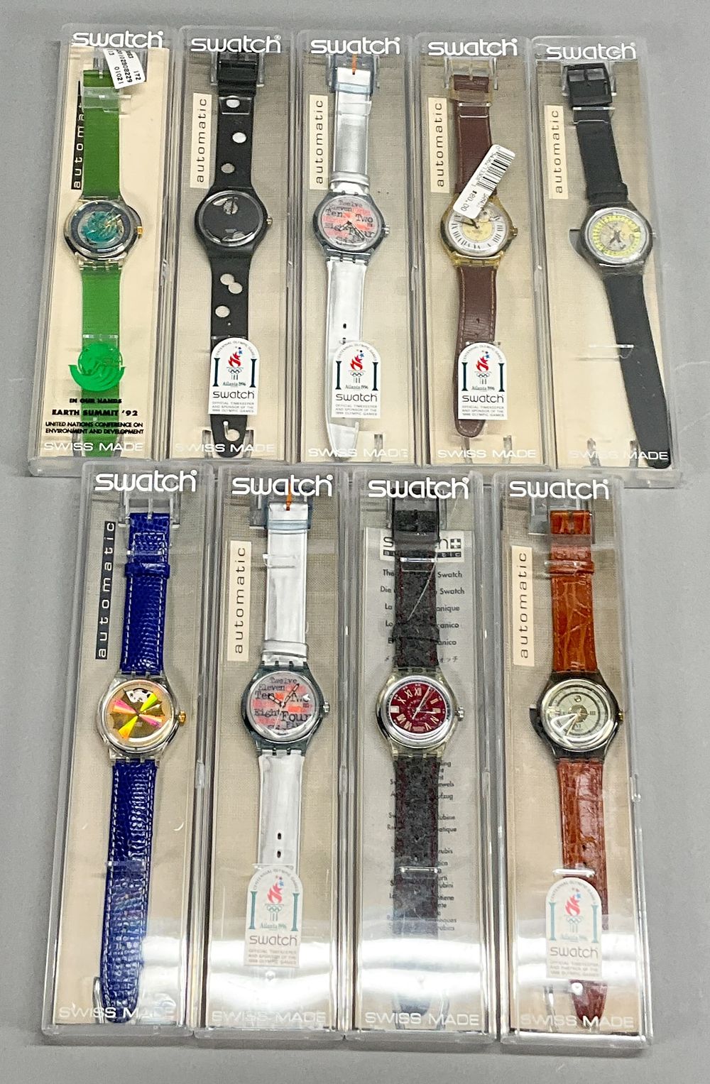 Lot 332: 9 Vintage Swatch Automatic Watches