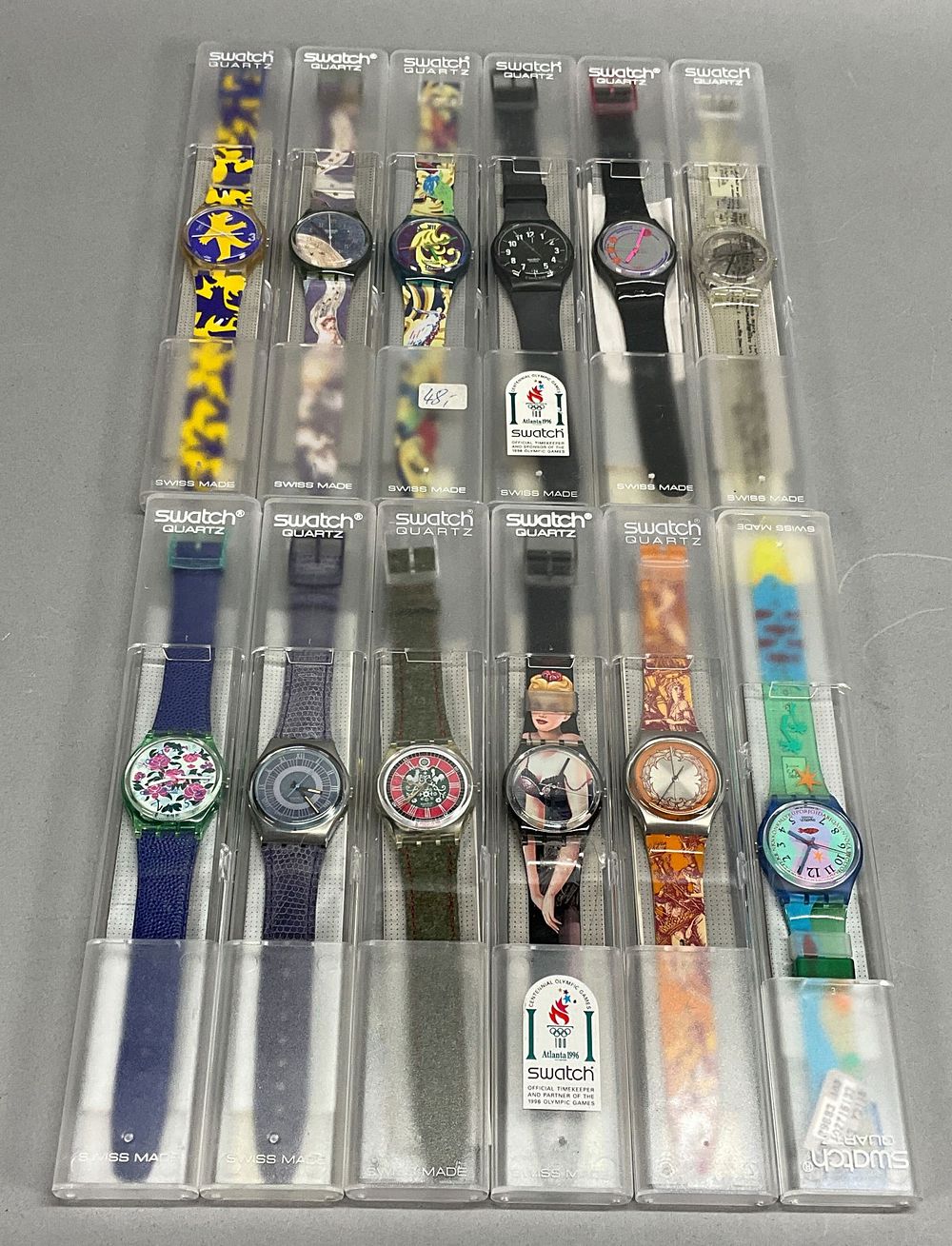 Lot 337: 12 Vintage Swatch Watches