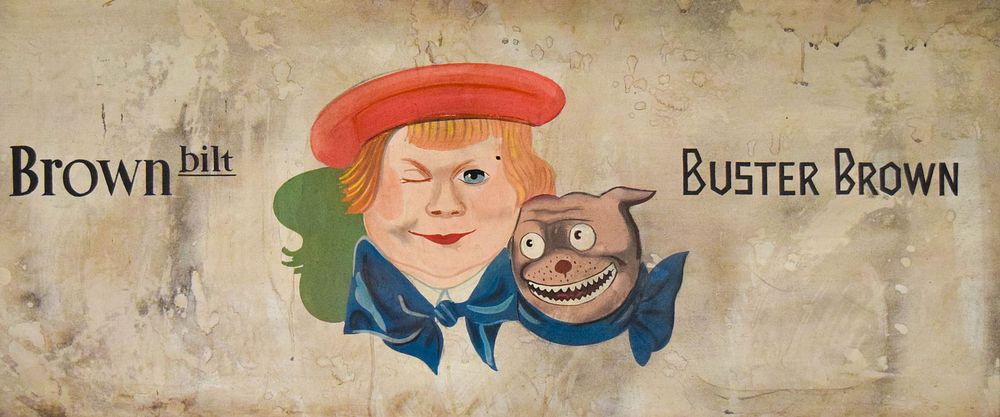Lot 402: Buster Brown Advertising Sign on Masonite