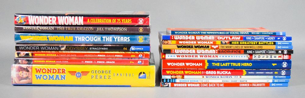 Lot 247: 18 Wonder Women Hardcovers And Trade Paperbacks
