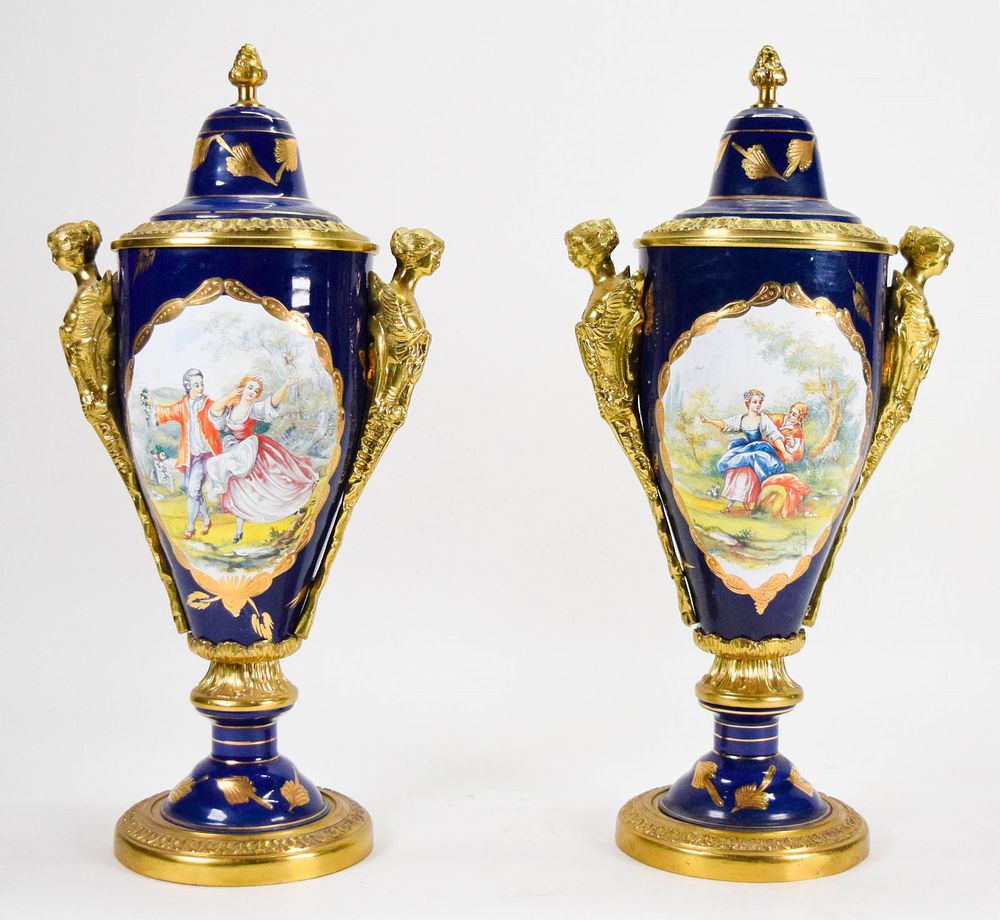 Lot 277: Pair of Sevres Style Porcelain Urns
