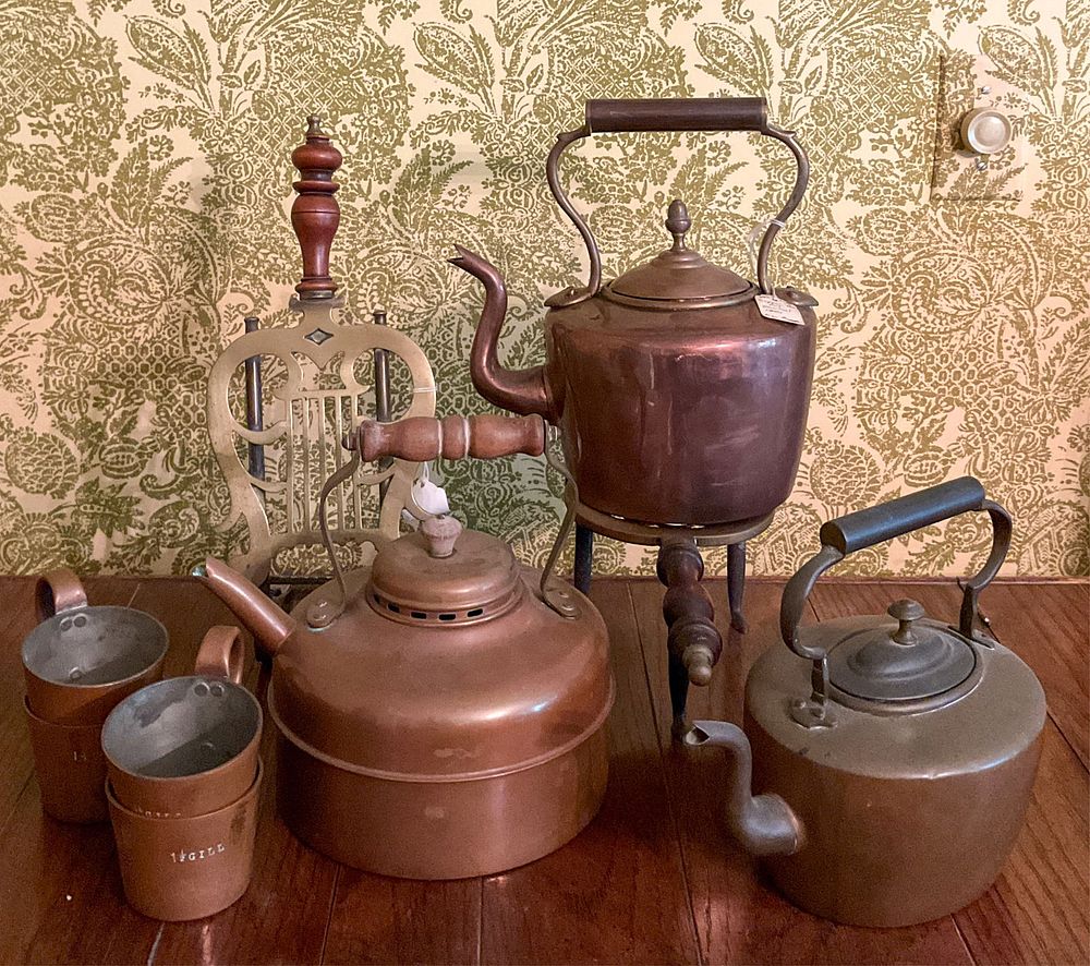 Lot 324: 3 Copper Kettles, Trivets, and 4 Copper Mugs
