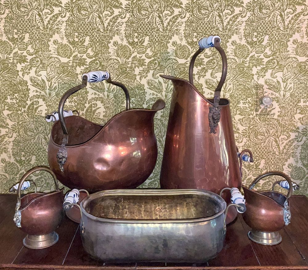 Lot 325: 5 Copper and Brass Pitchers Blue/White Handles