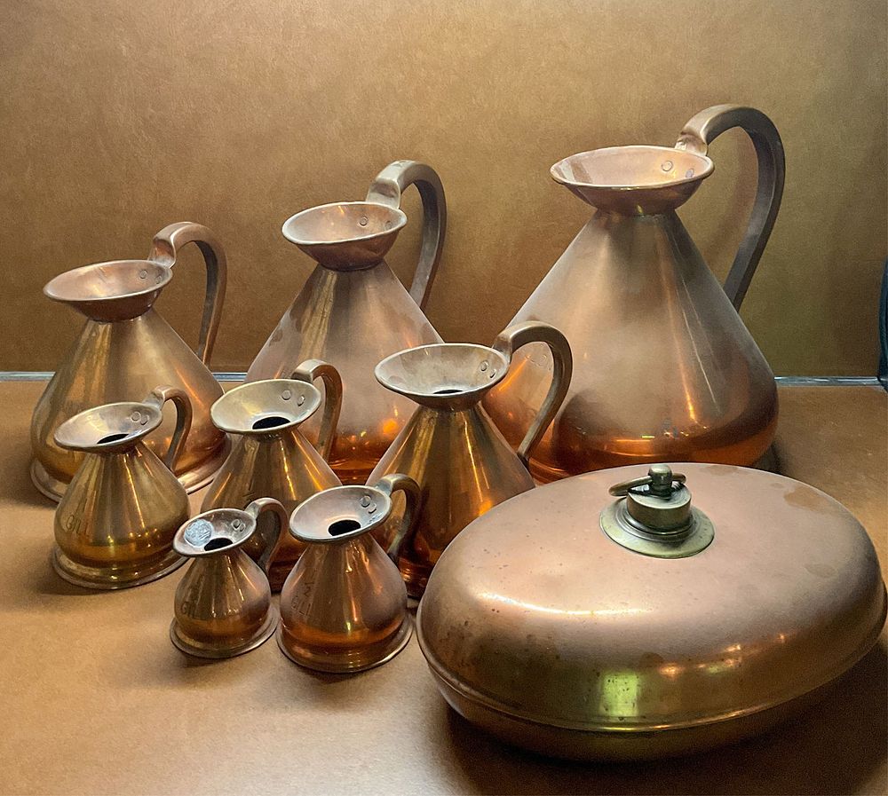 Lot 330: 8 Copper Haystack Pitchers and 1 Bed Warmer