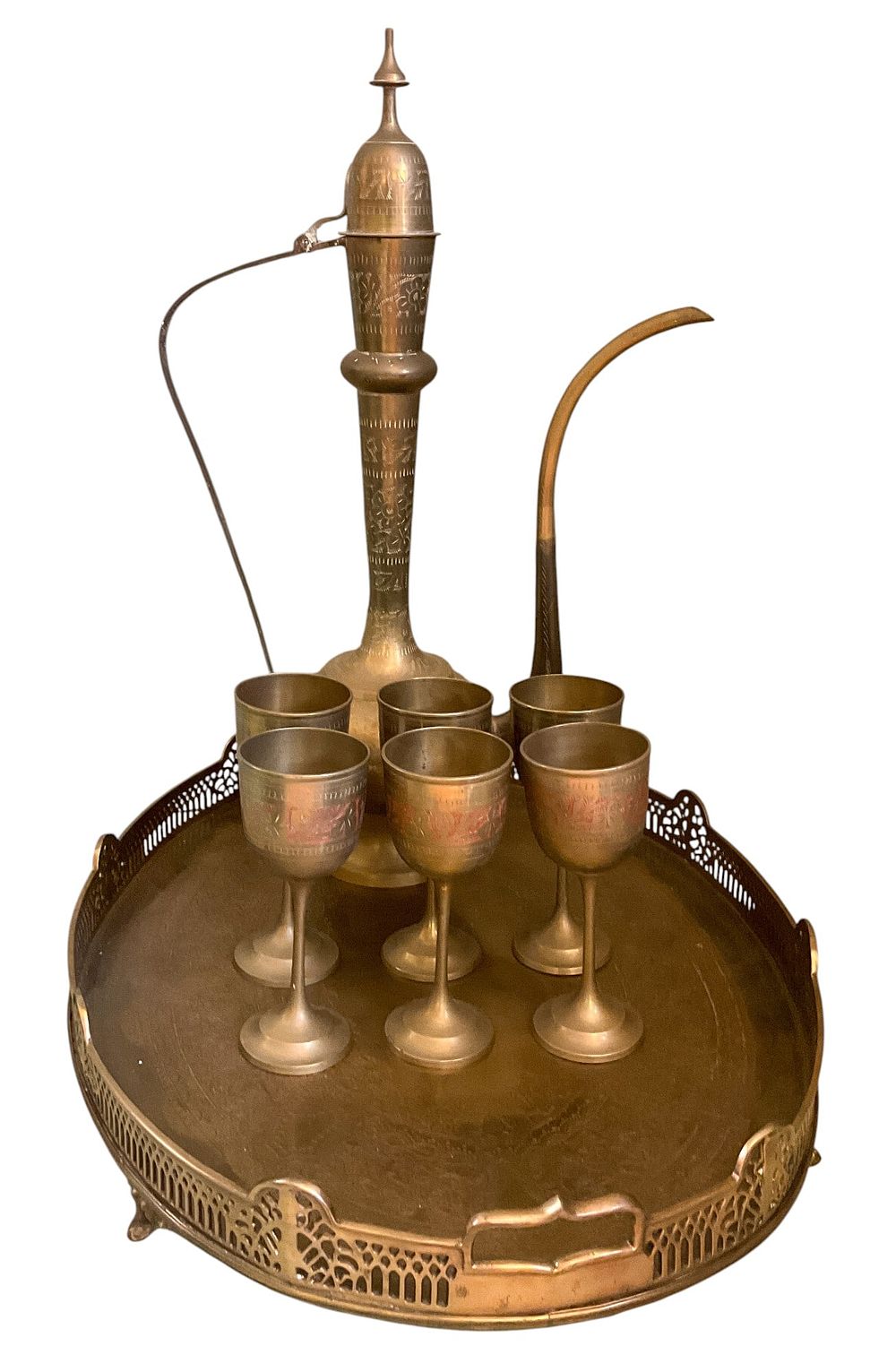 Indian Brass Coffee & Tea Set. Brass coffee and tea set including one pitcher, tray, and six 