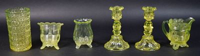 6 Pieces Vaseline Glass. 6 pieces Vaseline / uranium glass. Pair candlesticks, vase, thumbprint 
