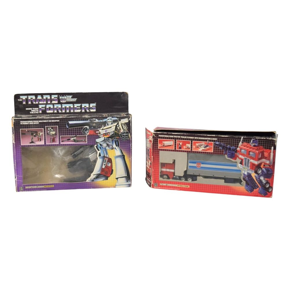 Lot 208: Hasbro Transformers G1 Optimus Prime and Megatron Action Figures in Original Boxes, c. 1984