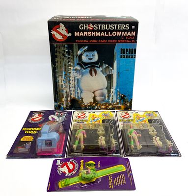 Group of Ghostbusters Memorabilia Incl Stay Puft Model Kit & Slimer Watch. Group of five vintage 