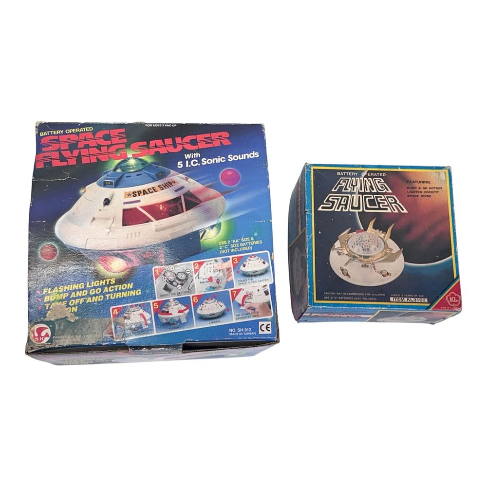 Lot 76: Horikawa and KL Battery-Operated Space Flying Saucer Toys with Original Boxes, circa 1980s