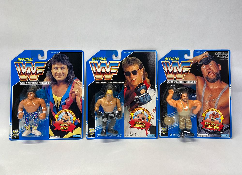 Lot 362: 3 Factory-Sealed Hasbro WWF Action Figures (Marty, Shawn, Luke) 1993-1994