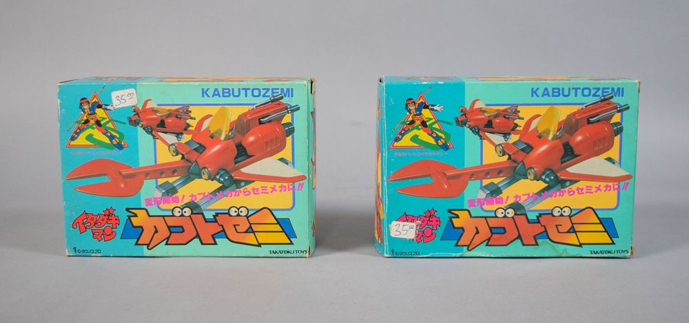 Lot 165: 2 Japanese Transforming Mecha Toys by Takatoku
