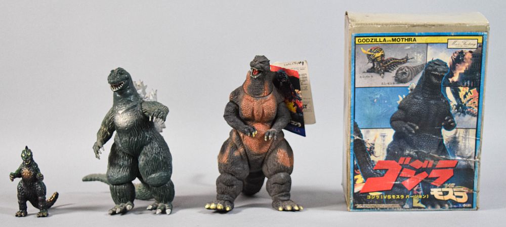 Lot 201: 4 Godzilla Vinyl Action Figures and Model Kits