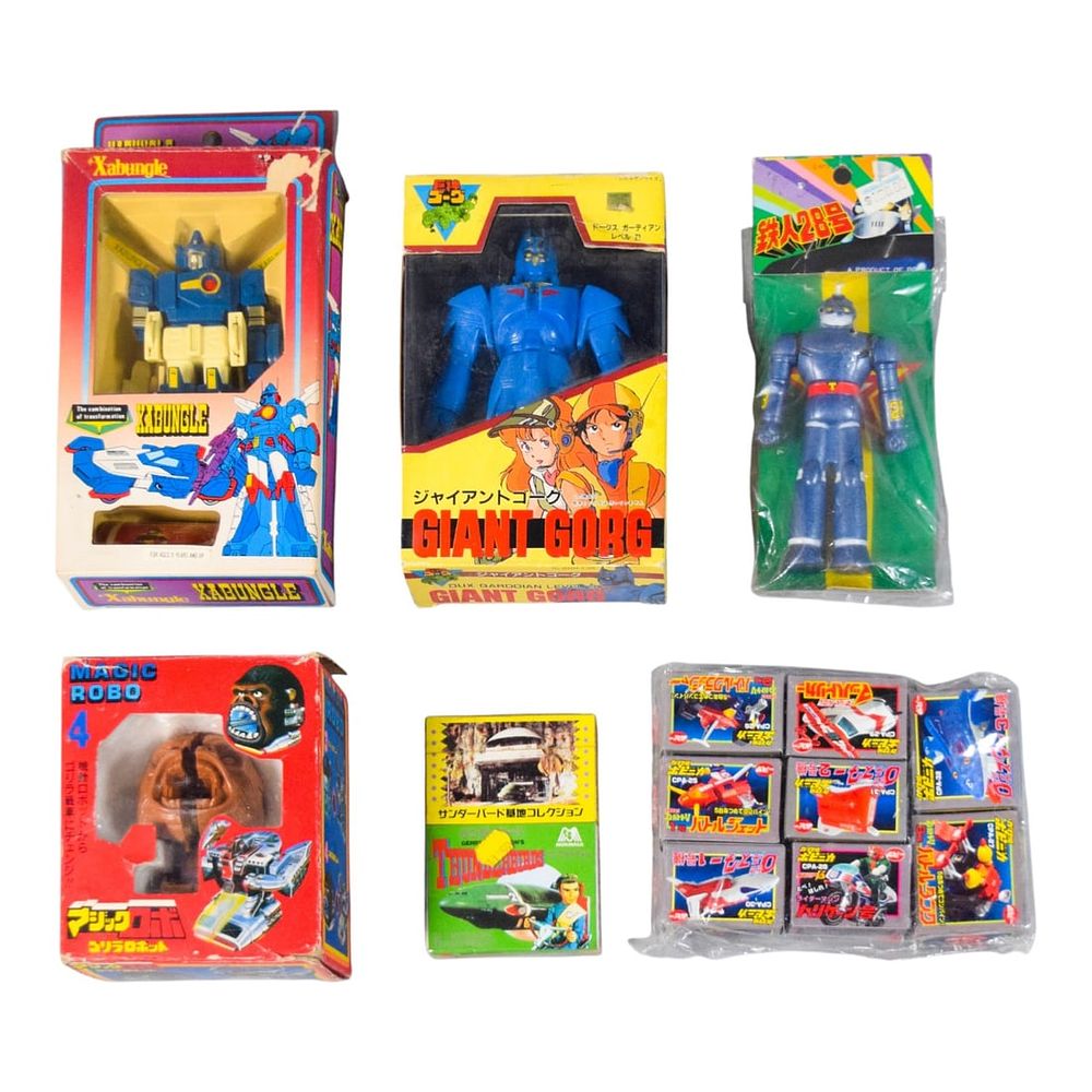 Lot 174: 13 Vintage Japanese Mecha & Character Toys