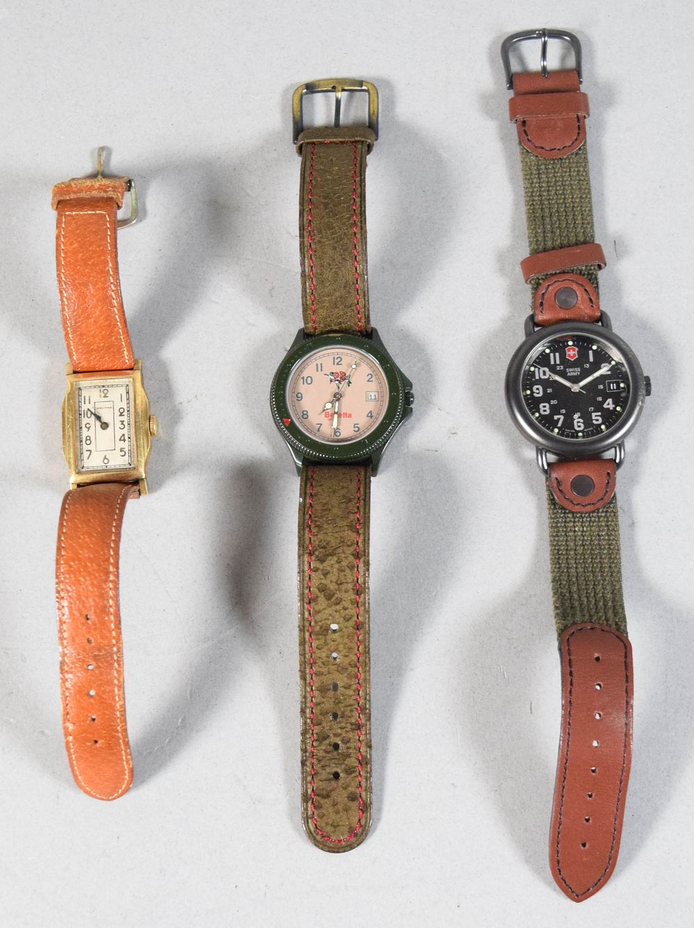 Lot 349: 3 Vintage Wristwatches Incl Waltham, Beretta, and Swiss Army
